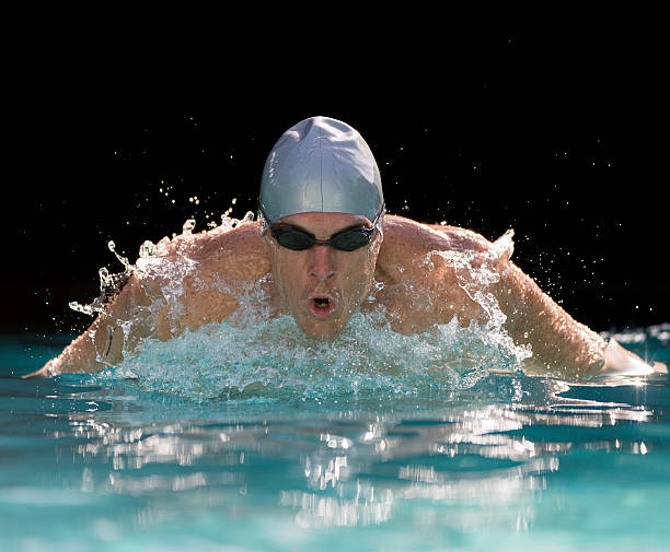 istock Young Man Swimming 510303415