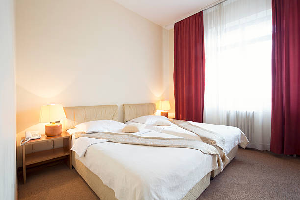 istock Hotel room interior with two beds 510303662