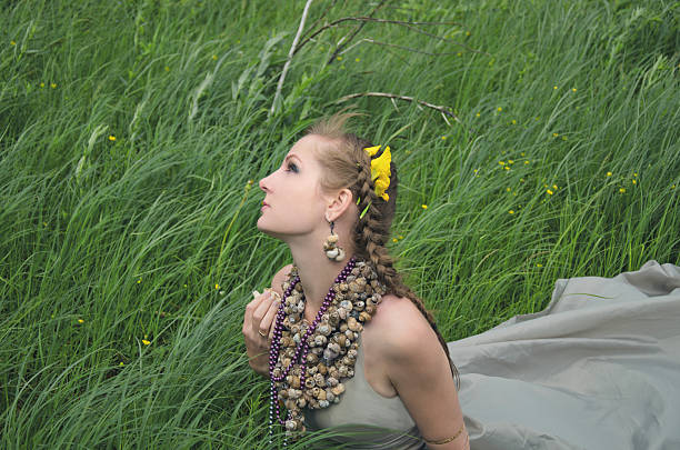 istock girl, grass and wind 510303915