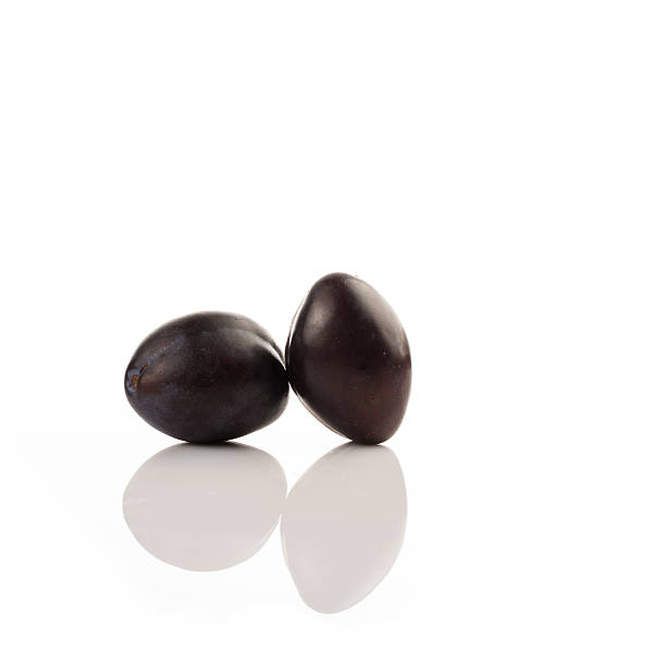 istock Plums on white isolated background 510304135