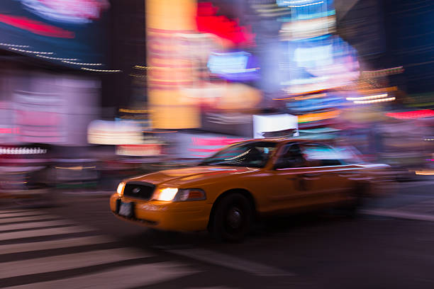istock Yellow Cab in The Night Lights 510304325