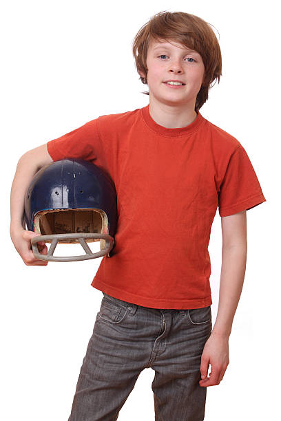 jugador de fútbol - youth league american football childhood helmet fotografías e imágenes de stock