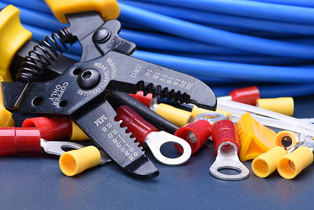 istock Tools for electrician and cables on metal surface 510304610