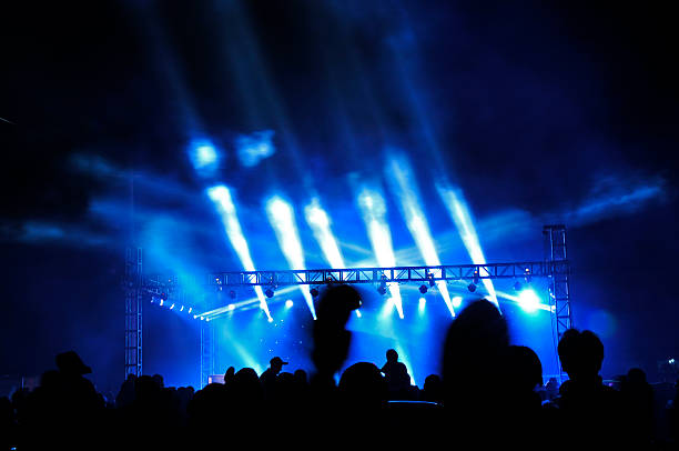 istock Stage lighting effect in the dark, fuzzy figure 510306033