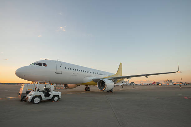 istock Airplane on airport runway at dusk 510307047