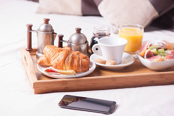 istock Breakfast in bed at a hotel room 510307340