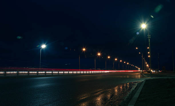 istock moving car with blur light through city night 510308020