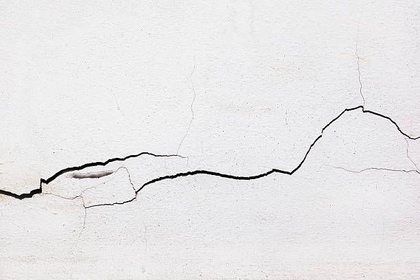 istock clacked cement of white wall 510308417