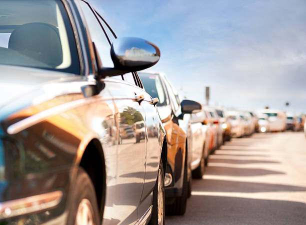 Row of parked cars stock photo