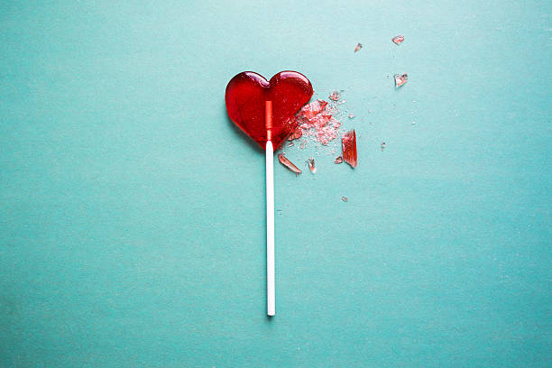 broken heart broken heart lollipop lolipop stock pictures, royalty-free photos & images