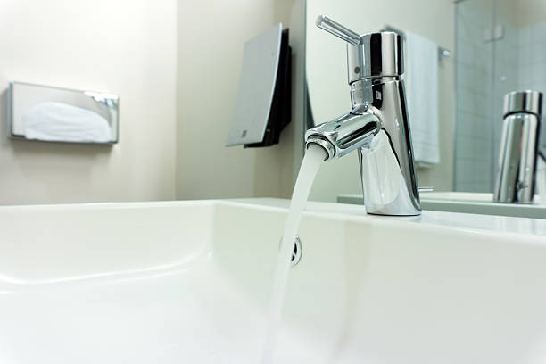 istock Modern bathroom faucet 510308932