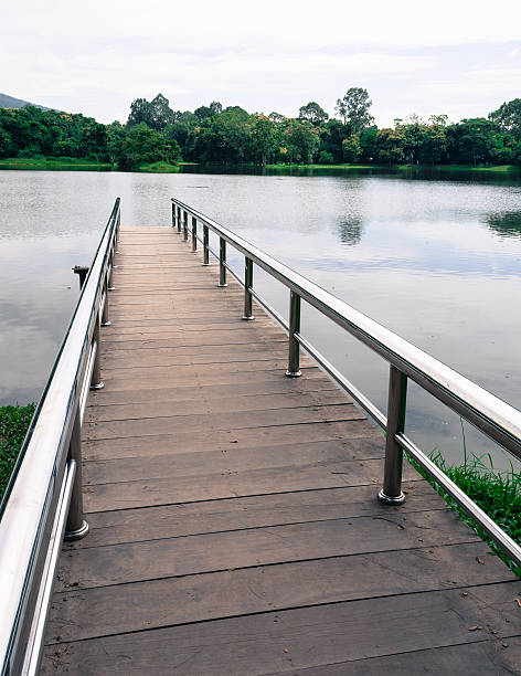 istock stainless steel bridge or pier at lake 510309321