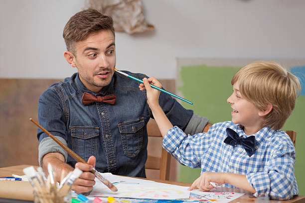 istock Father and child playing together 510309634