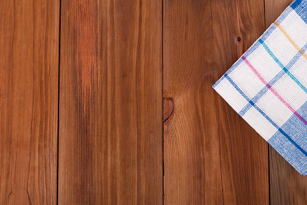 istock Kitchen napkin on a wooden table. 510309972