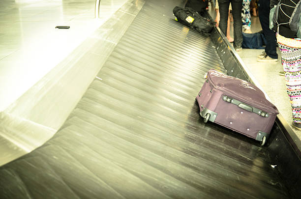 istock luggage claim airport 510310335