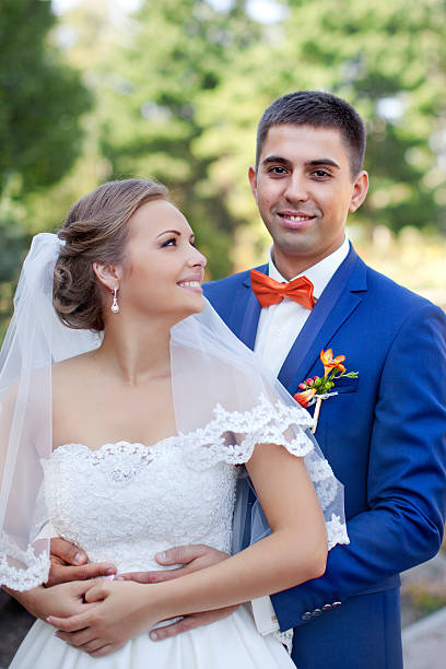 istock Funny couple on e-session. Preparing for wedding potography. 510312064