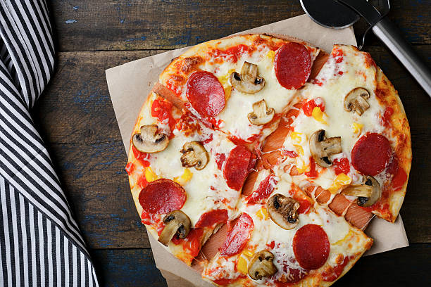 istock Sliced Pizza with sausage and mushrooms 510314142