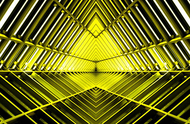 metal structure similar to spaceship interior in yellow light