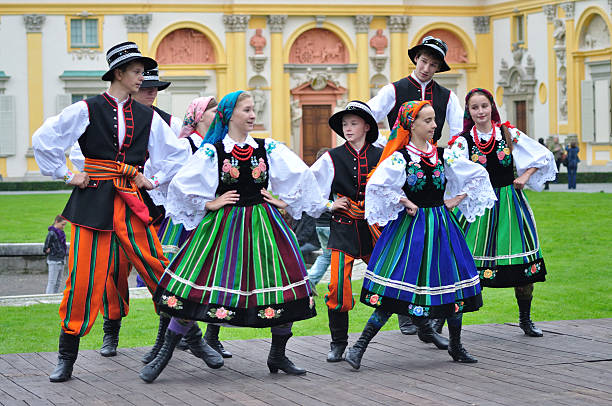 Lowicz folk dance Warsaw, Poland - September 11, 2010: Dancers of the ensemble Kuznia Artystyczna showing of the Lowicz folk dances, during of the Wilanow Days event. polish culture photos stock pictures, royalty-free photos & images