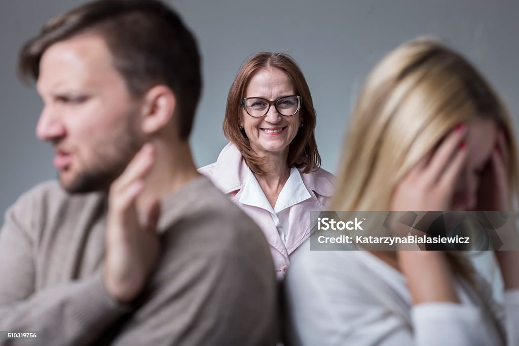 Mean and intrusive mother Photo of marital conflict and mean and intrusive mother Adult Stock Photo