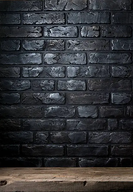 Photo of Brick wall and table