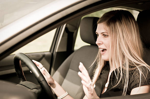 istock Before accident - young woman driving car 510322020