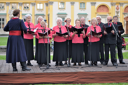 Warsaw, Poland - September 11, 2010: Choristers Wilanow Singers Group, singing popular convivial songs, during of the Wilanow Days event.