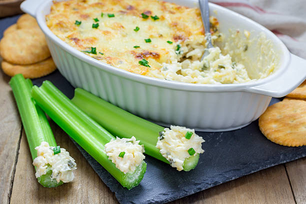 istock Baked crab dip, served with celery sticks and crackers 510325146