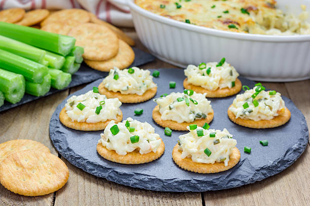 istock Baked crab dip, served with celery sticks and crackers 510325168