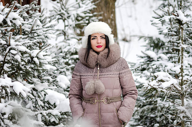 istock Beautiful woman in winter scenery in forest 510325508
