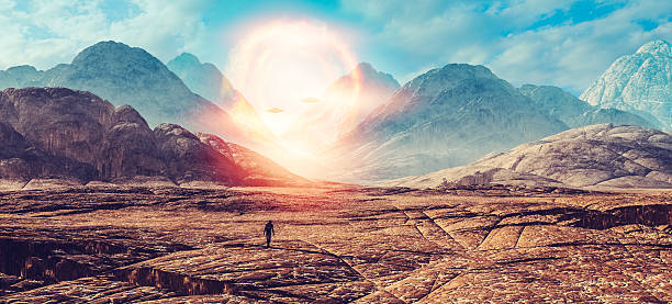istock Astronaut walking on alien planet, UFO portal 510327240