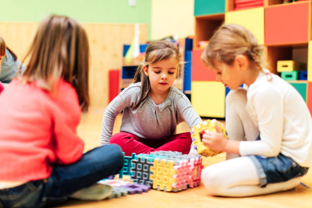 istock Children playing with blocks in kindergarten. 510329642