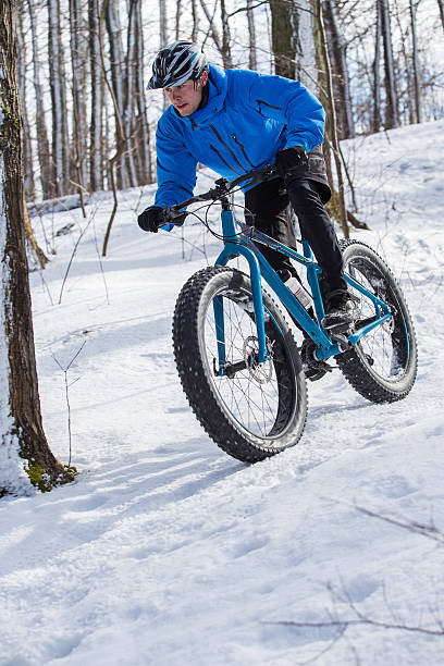 istock Fat biker riding in the snow 510330954