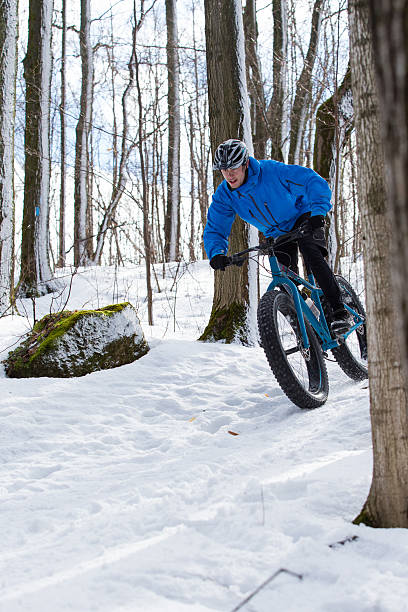 istock Fat biker riding in the snow 510331136