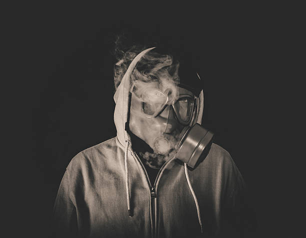 istock Smoking man with mask 510331540