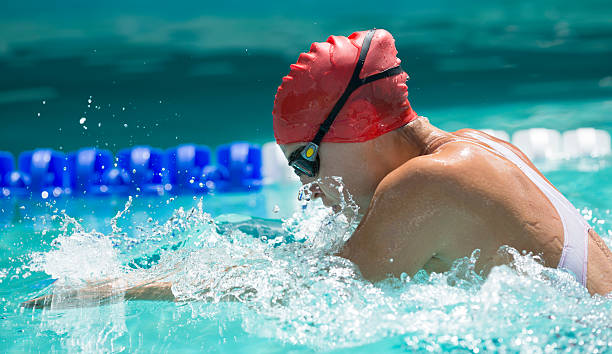 istock Young Woman Swimming 510332051