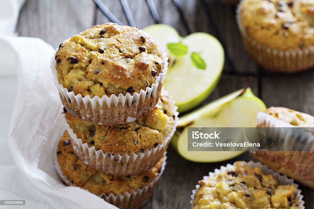 Gluten free almond and oat muffins Gluten free almond and oat muffins with apple and chocolate chips Apple - Fruit Stock Photo