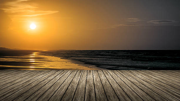 istock wooden jetty sunset 510332446