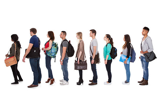 istock Multiethnic College Students Standing In A Row 510334207