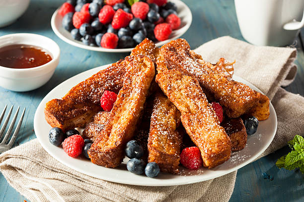 Homemade French Toast Sticks Homemade French Toast Sticks with Maple Syrup stick plant part stock pictures, royalty-free photos & images