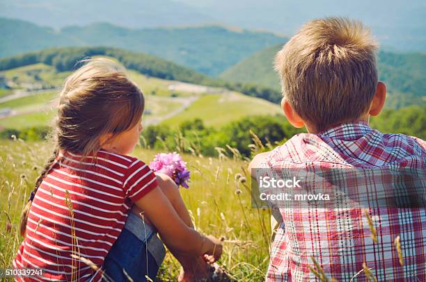 Kids Hiking In The Mountains In Italy Stock Photo - Download Image Now - 8-9 Years, Arrangement, Boys