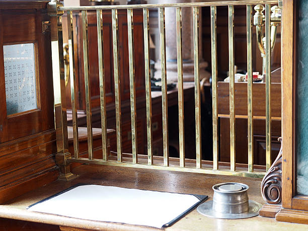 istock Old Style Bank Teller Window 510351891