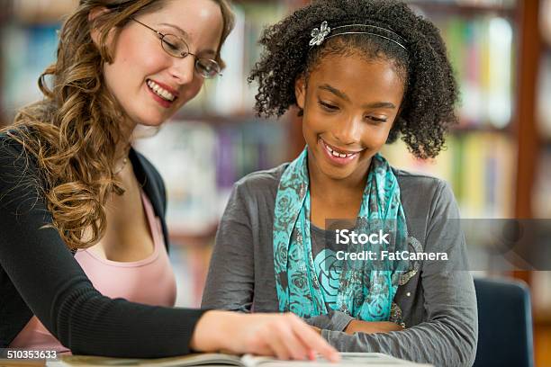 School Library Stock Photo - Download Image Now - 6-7 Years, 8-9 Years, Adult