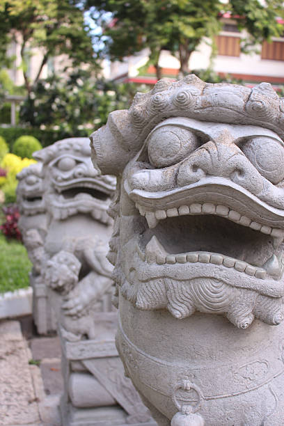 istock chinese lion statue in Wat Arun 510355695