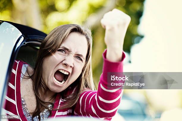 Women Drivers Get Road Rage Too Furious Female Shaking Fist Stock Photo - Download Image Now