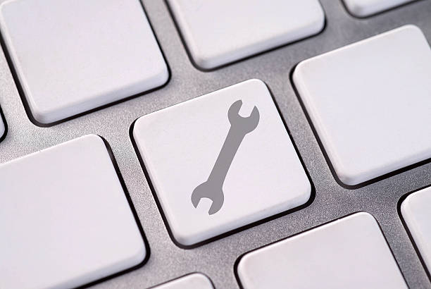 istock white Keyboard with symbolic spanner tool key 510358551