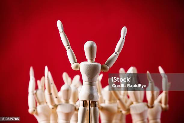 All Together Now Puppet Faces Others All With Raised Hands Stock Photo - Download Image Now