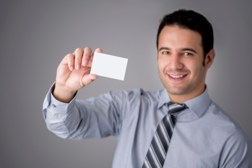 Business man holding a personal card