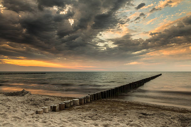 istock Sandy beach in the moody sunset 510372933