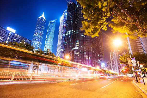 istock traffic through modern city with blur light 510373133